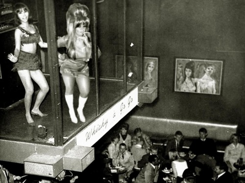 Two Dancers on Whisky A Go-Go cage 2nd floor over crowd